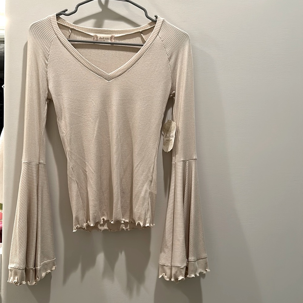 Cream long sleeve shirt